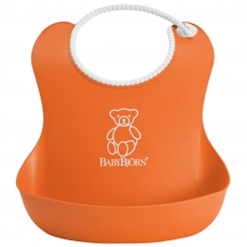 Нагрудник мягкий пластиковый для кормления ребенка BabyBjorn оранжевый