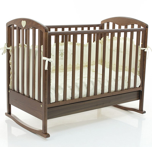 Детская кроватка Bambolina Cucciolo 125х65 орех